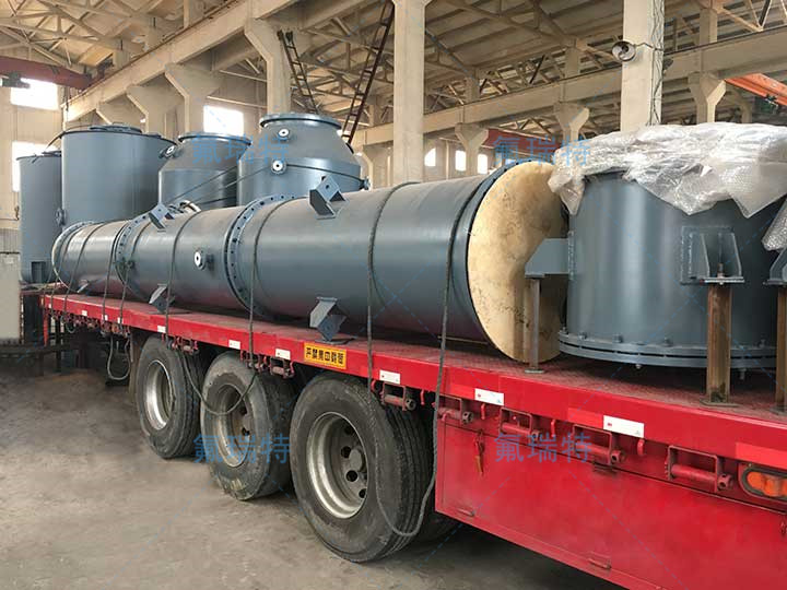 Steel lined PTFE tower 